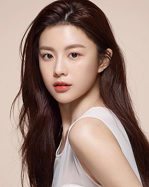 Go Yoon Jung Studio Portrait with Long Dark Hair and White Sleeveless Top HD phone wallpaper