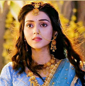 Mallika Singh in Traditional Indian Attire with Gold Jewelry and Blue Saree HD phone wallpaper
