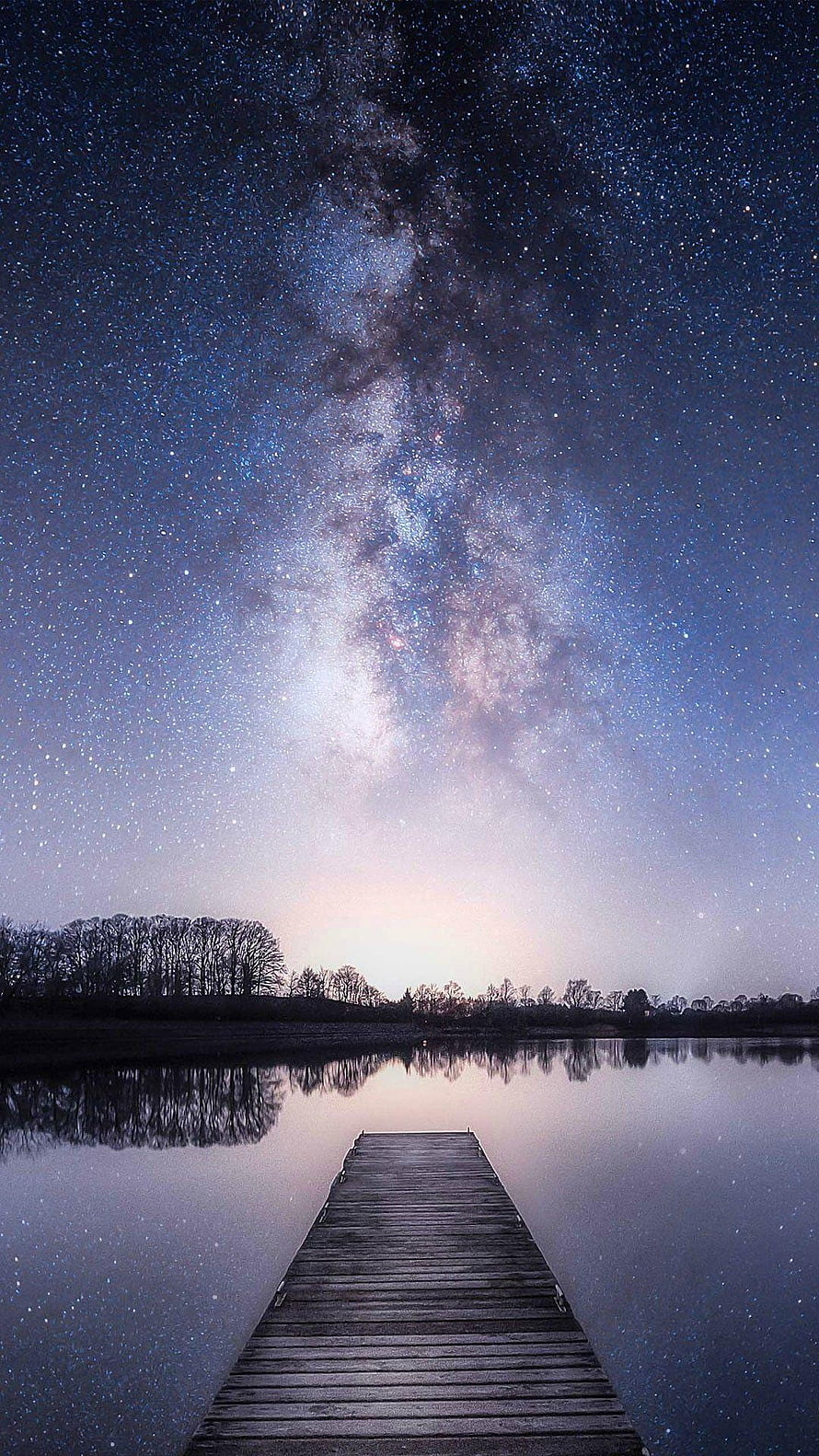 Milky Way Galaxy Over a Wooden Dock on a Calm Lake at Night HD phone wallpaper
