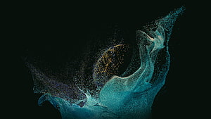 Abstract Particle Art of a Reaching Hand in Cyan and Gold on Black Background HD wallpaper