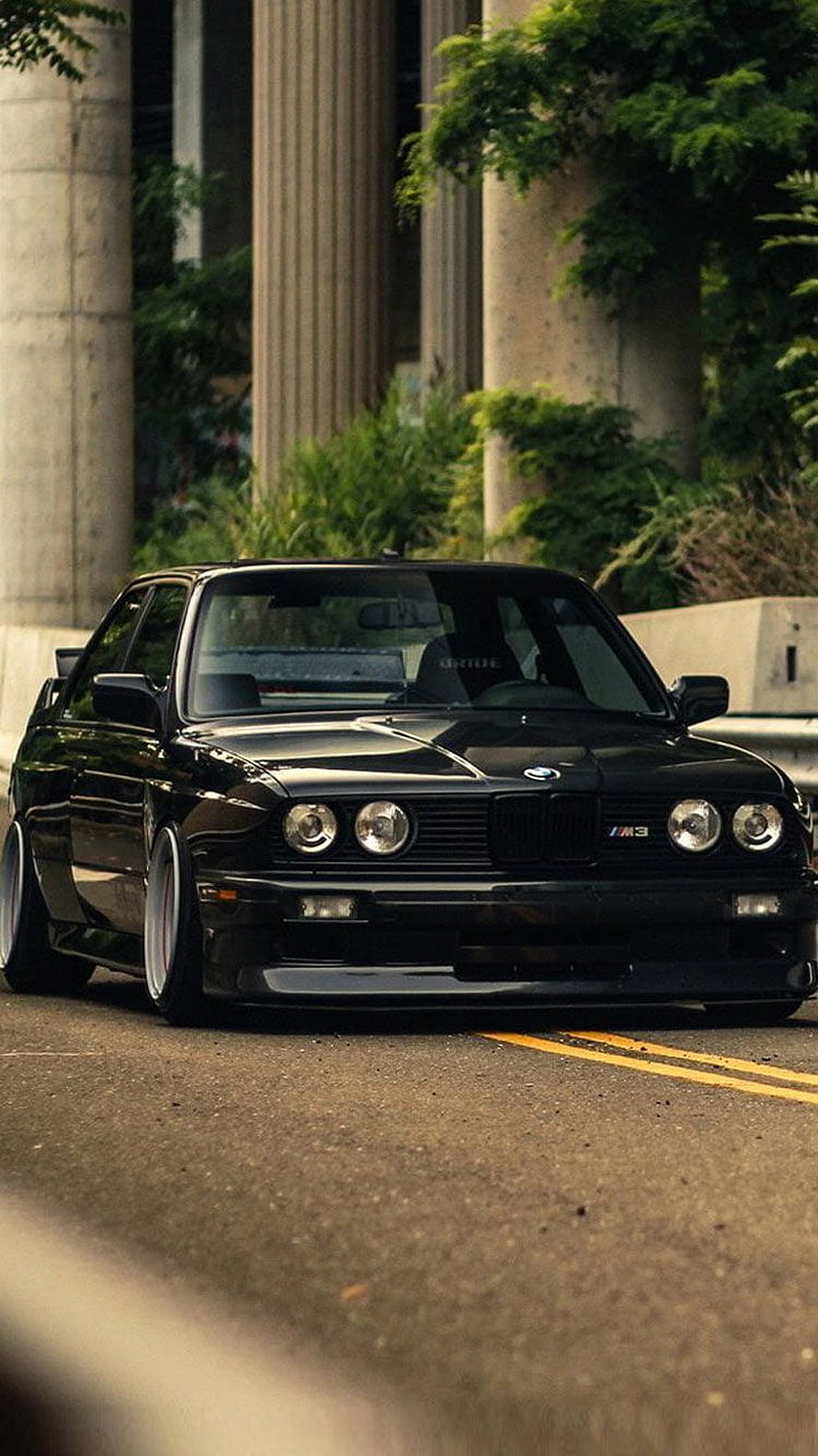 Black BMW E30 M3 Stance Build Parked on Urban Street HD phone wallpaper