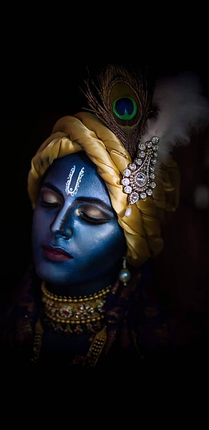 Lord Krishna Portrait with Blue Face, Golden Turban, and Peacock Feather HD phone wallpaper