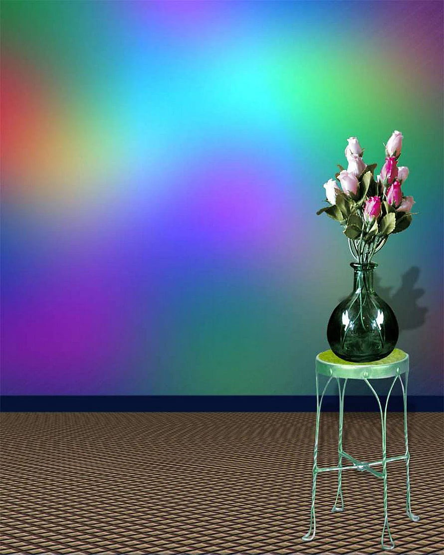 Pink roses in a green glass vase on a wire stand against a vibrant rainbow gradient studio backdrop HD phone wallpaper
