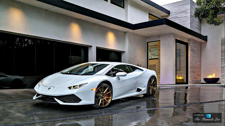 White Lamborghini Huracan Parked in Front of Modern Luxury Villa HD wallpaper