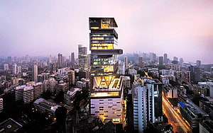 Antilia Residence Mumbai Skyline at Dusk with Illuminated Facade and City Lights HD wallpaper