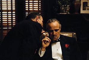 The Godfather Movie Scene Featuring Marlon Brando in a Formal Black Tie Setting HD wallpaper