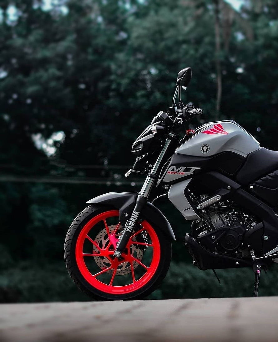 Yamaha MT-15 V2 Street Bike With Red Rims Parked On A Forest Road HD phone wallpaper