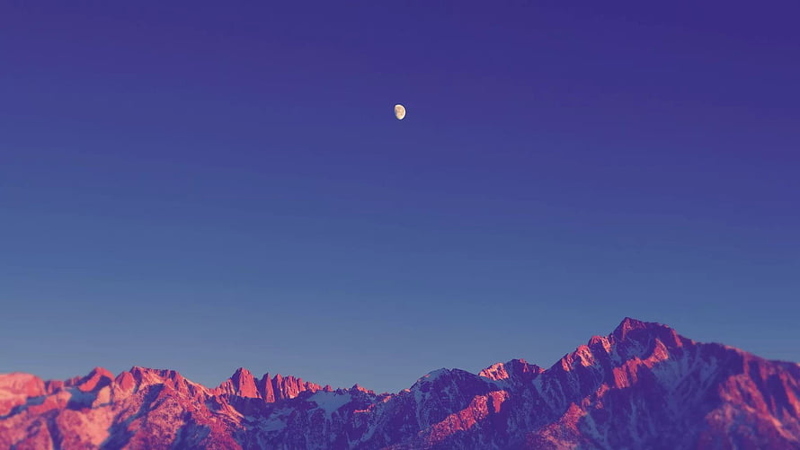 Gibbous Moon Over Snow-Capped Mountain Peaks at Twilight HD wallpaper