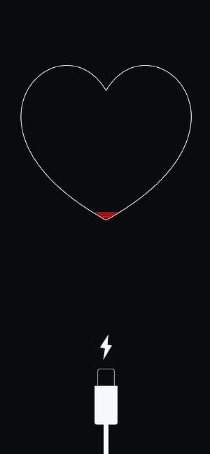 Minimalist Heart Battery Charging Icon on Black Background HD phone wallpaper