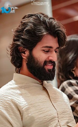 Vijay Deverakonda in a cream kurta with a full beard and wavy hair HD phone wallpaper