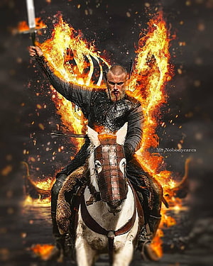 Bjorn Ironside on Horseback with Sword and Flames in Viking Armor HD phone wallpaper