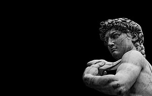 Michelangelo's David Statue in Black and White Marble Sculpture HD wallpaper
