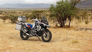 BMW R 1250 GS Adventure Motorcycle Parked in Dry Savanna Landscape HD wallpaper