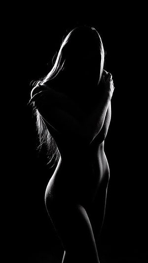Elegant Female Silhouette in Dramatic Black and White Studio Lighting HD phone wallpaper