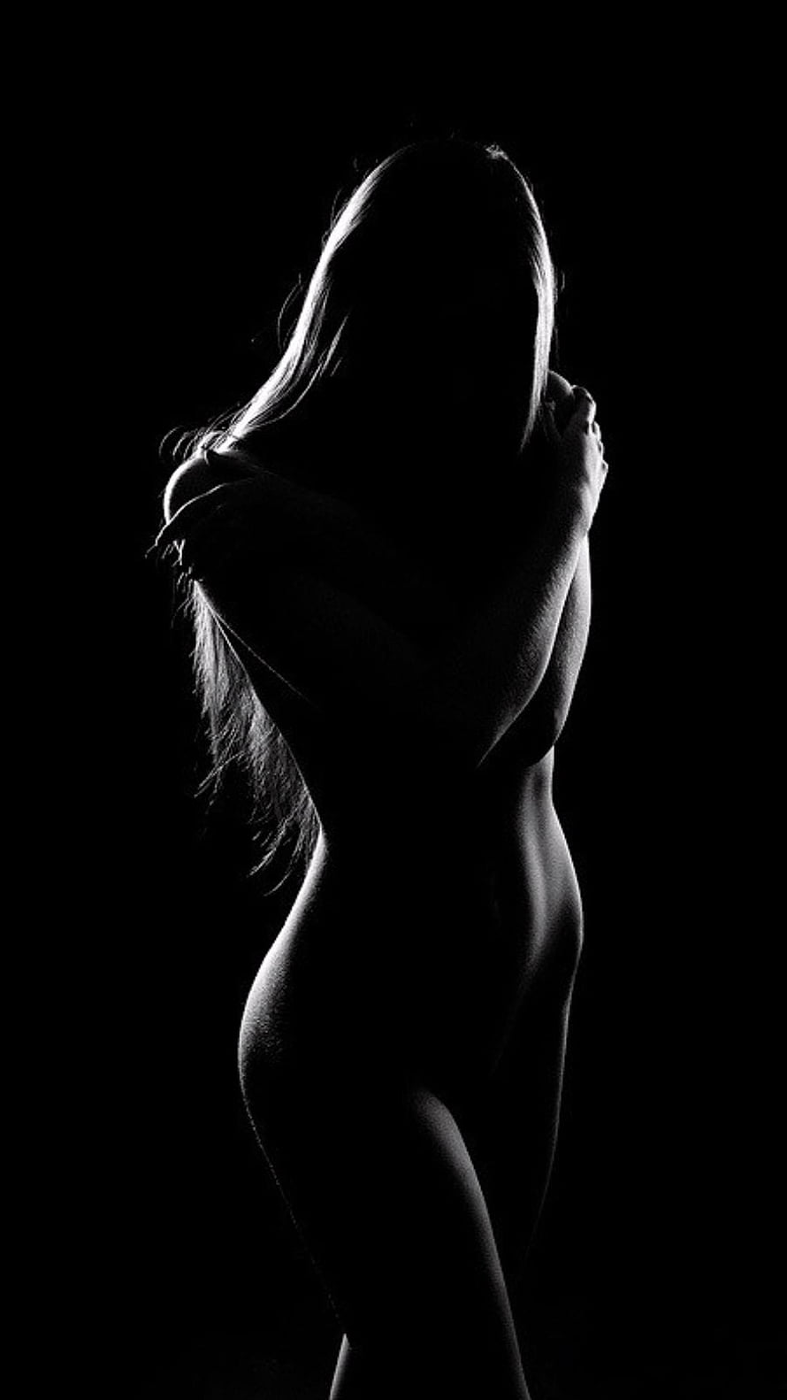 Elegant Female Silhouette in Dramatic Black and White Studio Lighting HD phone wallpaper