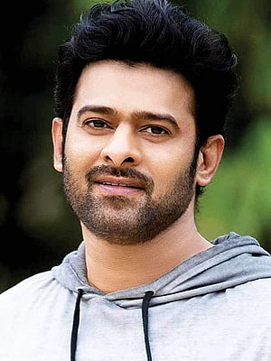 Prabhas in a casual grey hoodie with a trimmed beard and styled dark hair HD phone wallpaper