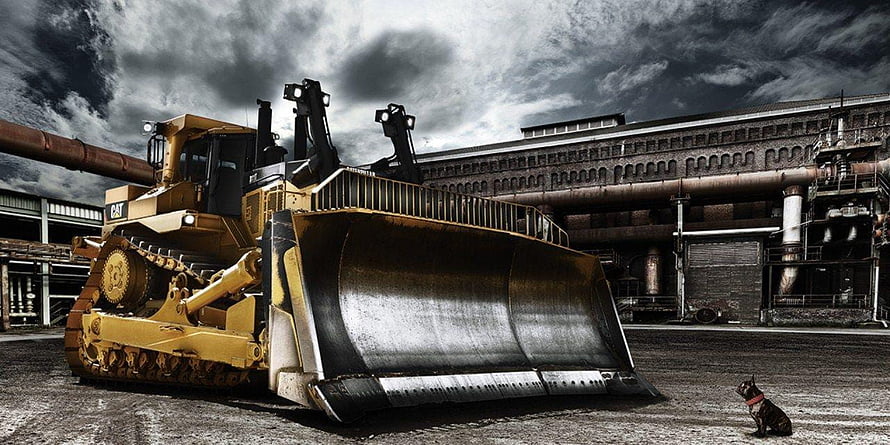 Caterpillar C17 Dozer in Industrial Yard with Dramatic Sky HD wallpaper