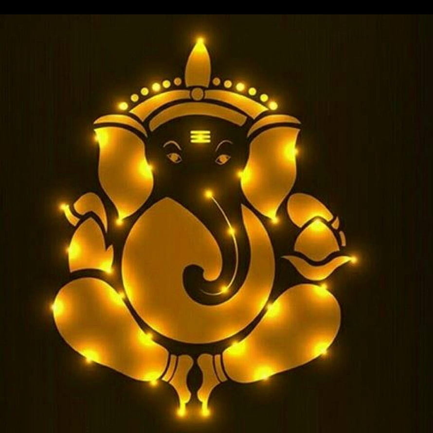 Glowing Golden Ganesha Silhouette with Festive Light Accents on Dark Background HD phone wallpaper