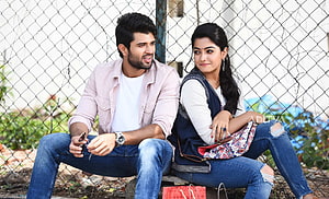 Geetha Govindam Movie Still Featuring Young Couple Sitting Against Chain Link Fence HD wallpaper