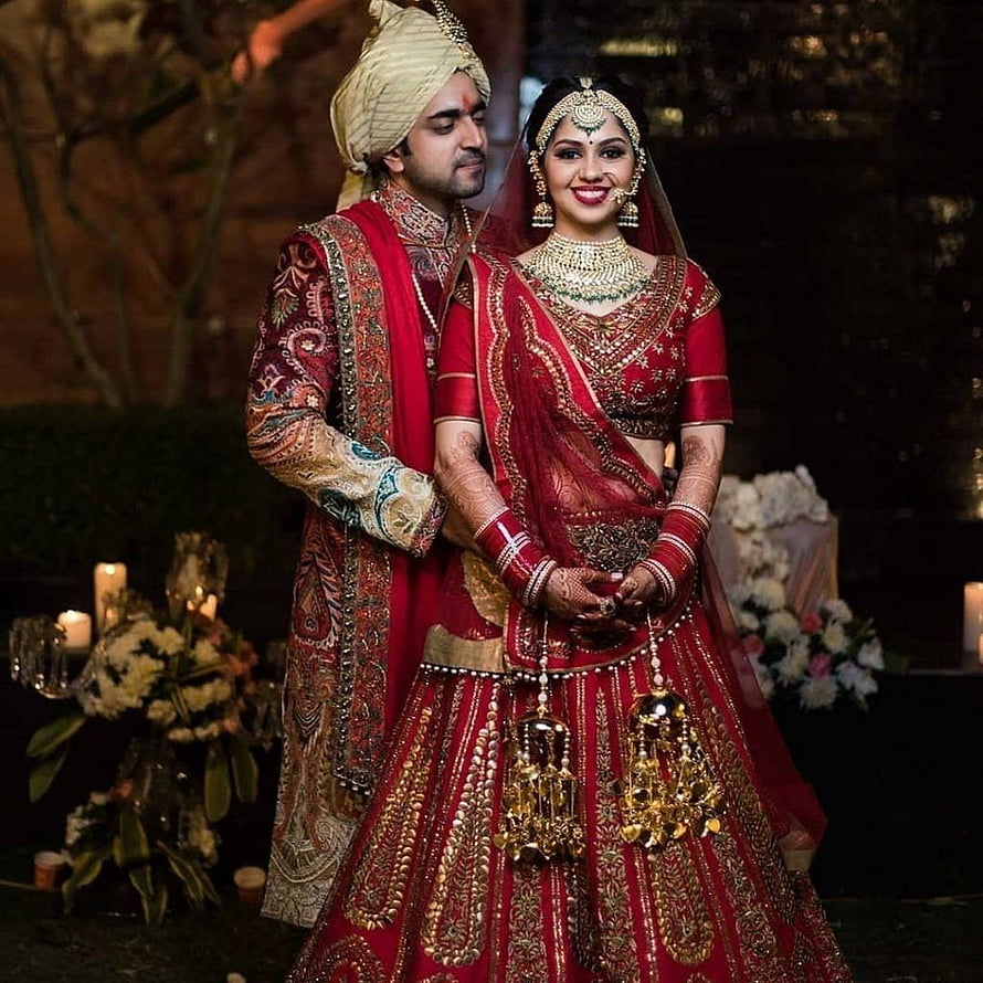 Traditional Indian Wedding Couple in Red and Gold Bridal Attire HD phone wallpaper