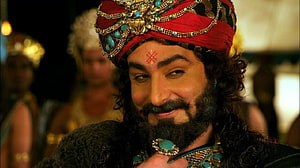 Shakuni Character Portrait from the Mahabharata TV Series in Ornate Turban and Jewelry HD wallpaper