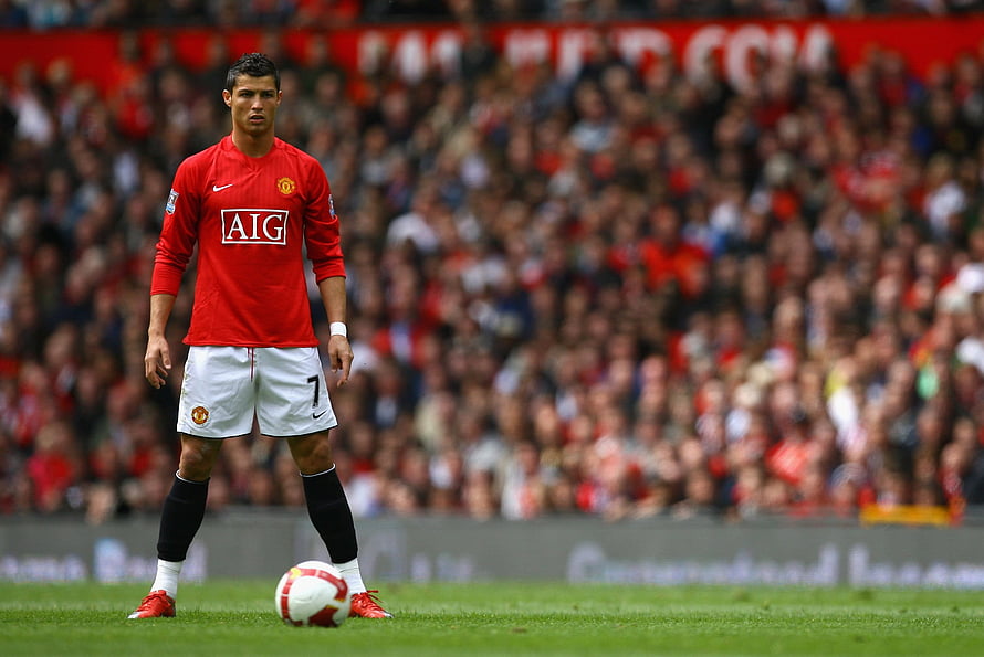 Cristiano Ronaldo in Manchester United Home Kit with AIG Sponsor on the Pitch HD wallpaper