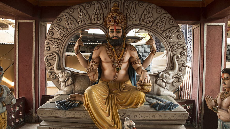 Vishwakarma Deity Statue in Traditional Indian Temple Setting HD wallpaper