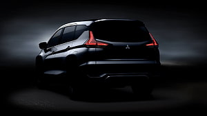 Mitsubishi Xpander SUV Rear View in Dramatic Dark Studio Lighting HD wallpaper