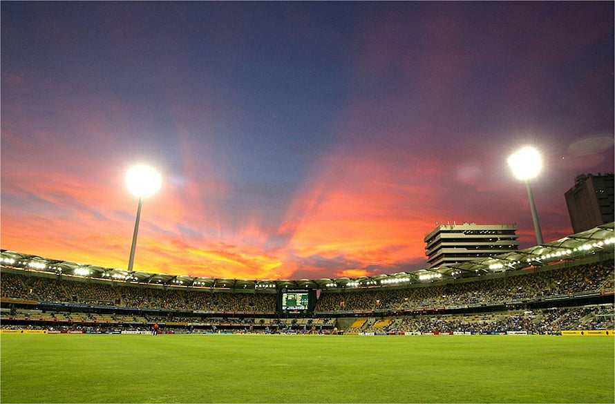 Brisbane Cricket Ground at Woolloongabba Under a Vibrant Sunset Sky HD wallpaper