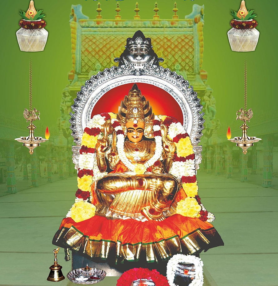 Bannari Amman Temple Deity with Ornate Garlands and Traditional Decorations HD phone wallpaper