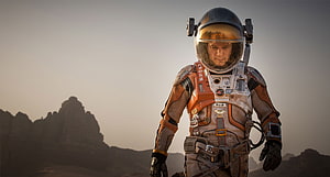 The Martian Movie Still Featuring Matt Damon in Spacesuit on Red Planet Surface HD wallpaper