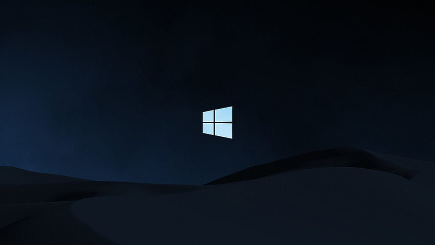 Windows 10 Logo Floating Over Dark Desert Dunes at Night HD wallpaper
