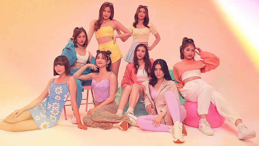 BINI Group Photo in Pastel Outfits Against Warm Gradient Studio Background HD wallpaper