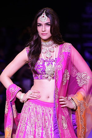 Kriti Sanon in Vibrant Pink and Purple Bridal Lehenga with Gold Embroidery HD phone wallpaper