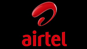Airtel Corporate Brand Identity Featuring Glossy Red Spiral Symbol on Black Background HD wallpaper