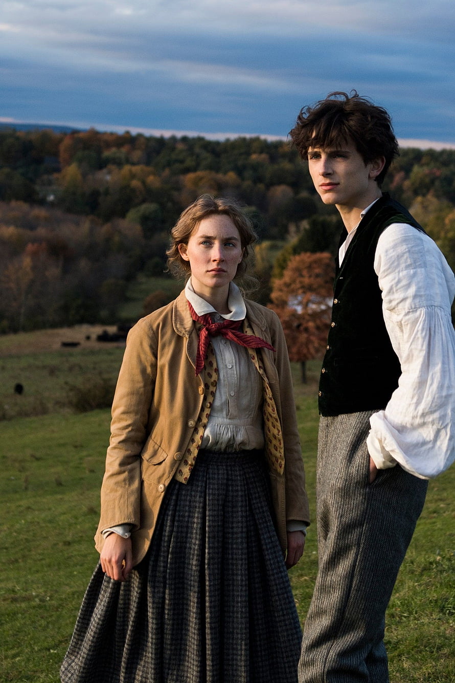 Saoirse Ronan and Timothée Chalamet in period costumes on a rural hillside in Little Women HD phone wallpaper