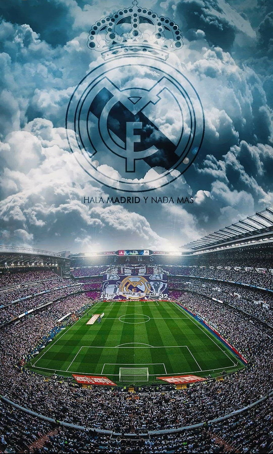 Real Madrid Stadium Crowd and Crest Under Dramatic Cloudy Sky HD phone wallpaper
