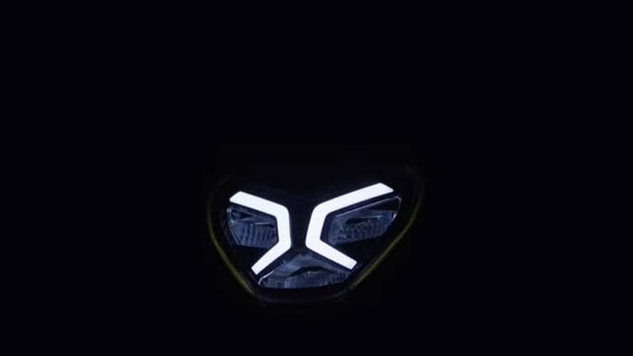 TVS Raider Motorcycle Headlight Design with Distinctive X-Shaped LED Signature HD wallpaper