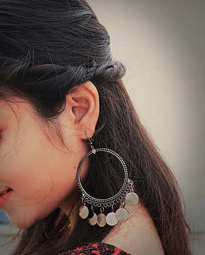 Close-up of woman's ear with large silver hoop earring featuring dangling coin charms, Dp For Whatsapp Profile For Girl, girl mobile hidden face HD phone wallpaper