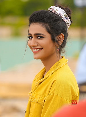 Priya Prakash Varrier in Yellow Jacket and Floral Headband HD phone wallpaper