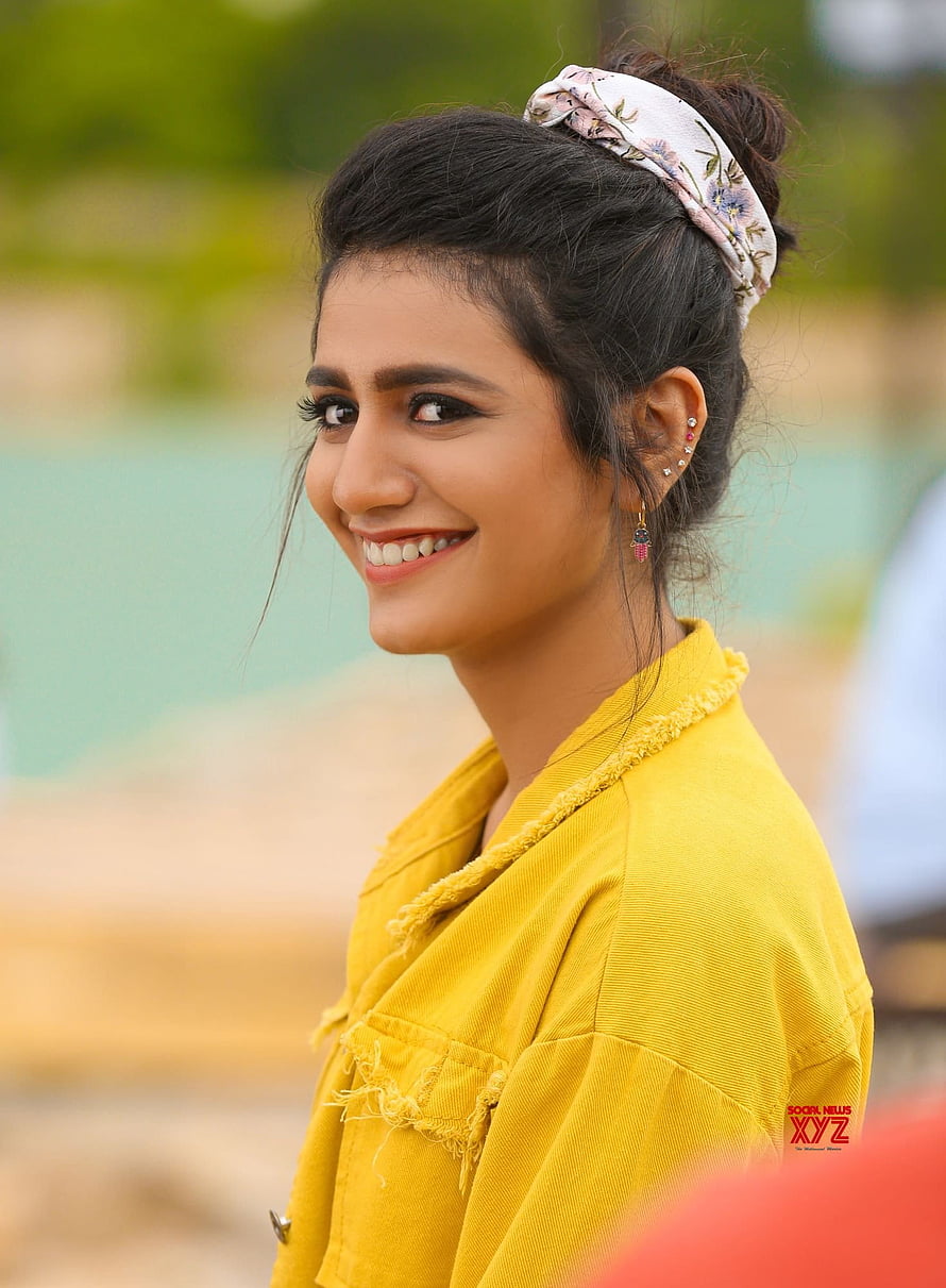 Priya Prakash Varrier in Yellow Jacket and Floral Headband HD phone wallpaper