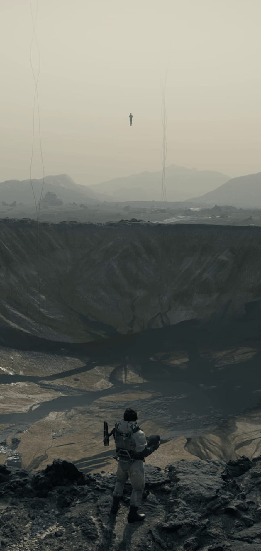 Death Stranding Character Overlooking Vast Crater Landscape in Desolate Sci-Fi World HD phone wallpaper