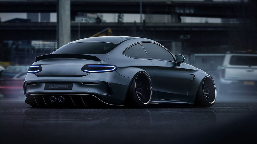 Sleek Matte Black Sports Coupe with Neon Taillights in Urban Night Setting HD wallpaper