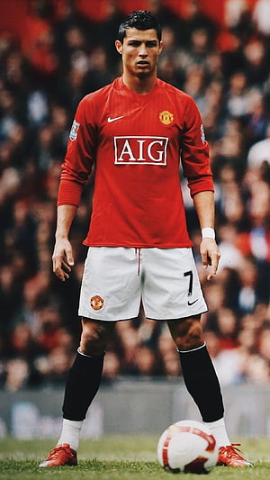 Cristiano Ronaldo in Manchester United Home Kit with AIG Sponsor on the Pitch HD phone wallpaper