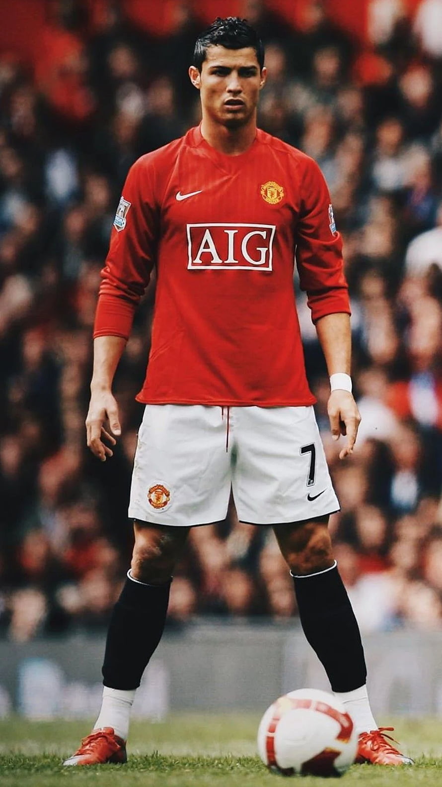 Cristiano Ronaldo in Manchester United Home Kit with AIG Sponsor on the Pitch HD phone wallpaper