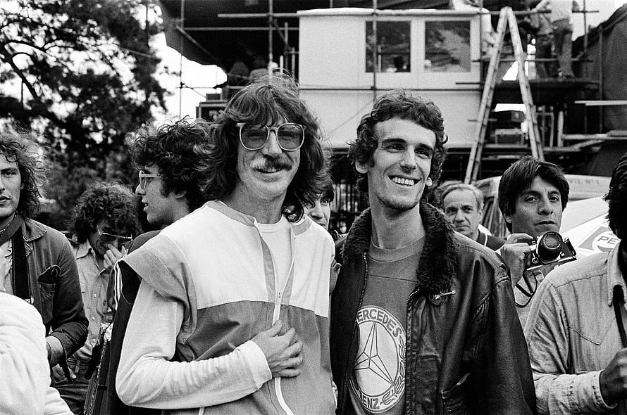 Charly Garcia and a smiling companion in a vintage black and white photograph HD wallpaper