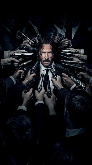 John Wick Surrounded by Guns in Dark Cinematic Action Scene HD phone wallpaper