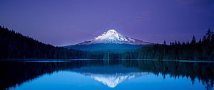 Snow-Capped Volcanic Peak Reflected in a Calm Alpine Lake at Twilight HD wallpaper
