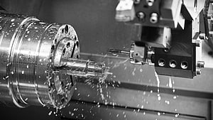CNC Lathe Machining Metal Workpiece With Coolant Spray And Cutting Tool HD wallpaper