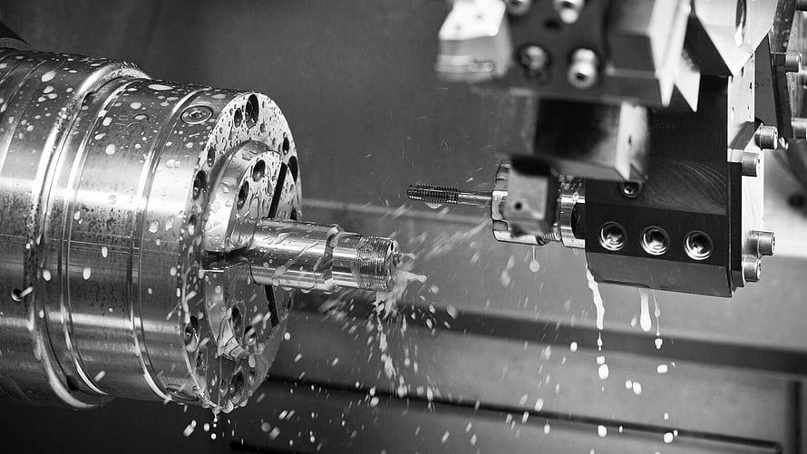 CNC Lathe Machining Metal Workpiece With Coolant Spray And Cutting Tool HD wallpaper